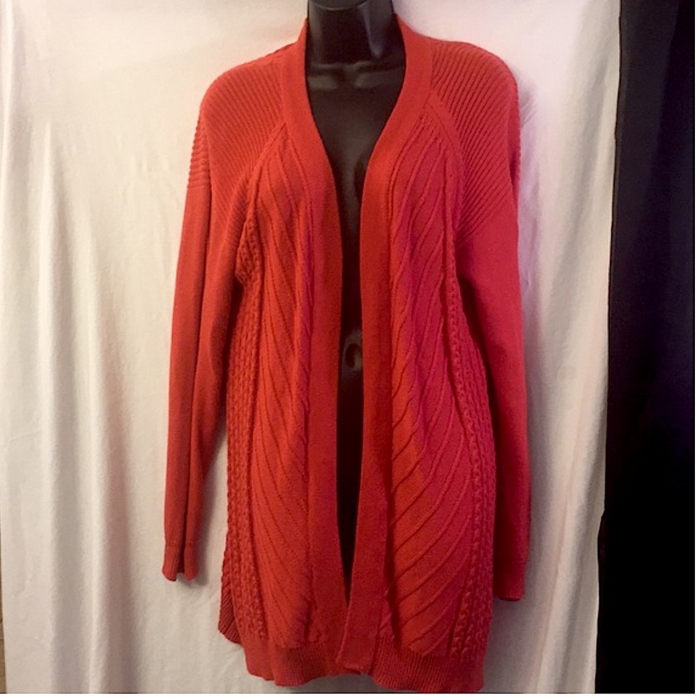 Women’s Belldini orange chevron pattern cardigan. Size small.